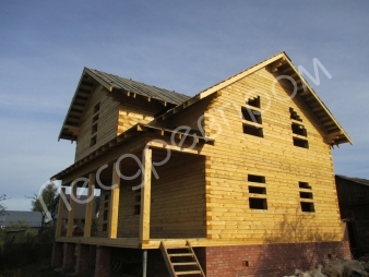 Деревянный дом с цокольным этажом  